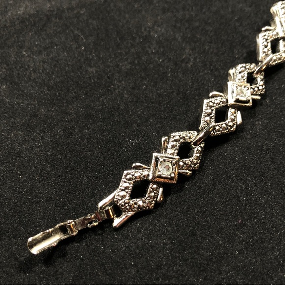 BRACELET - SILVER-TONE WITH 7 RHINESTONES EACH SET IN A SQUARE SETTING - Picture 7 of 16